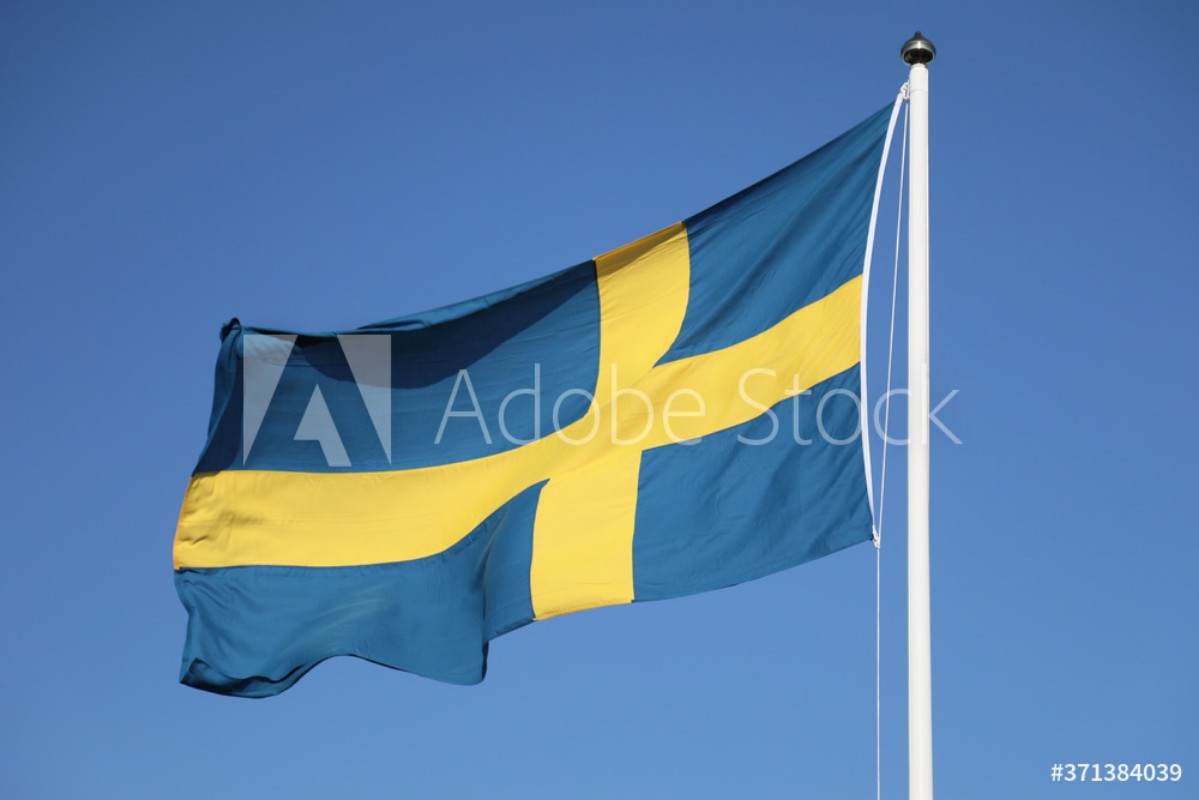 Picture of Swedish Flag against Blue Sky