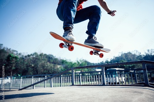Picture of Skateboarder skateboarding at skatepark ramp
