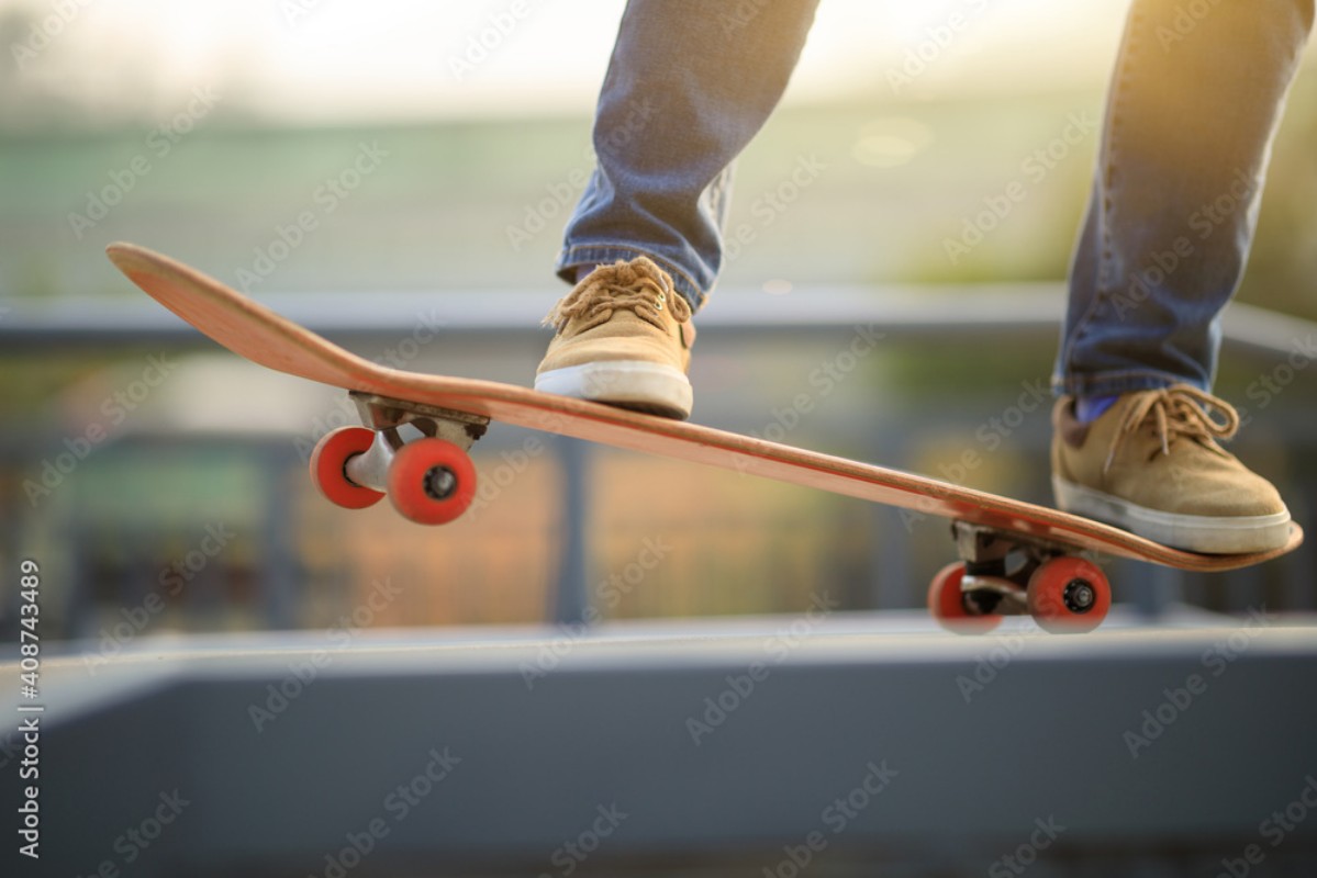 Afbeeldingen van Skateboarder legs skateboarding at outdoors