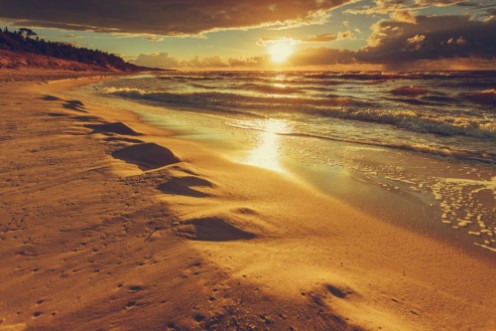 Picture of Beatiful sunset with clouds over sea and beach