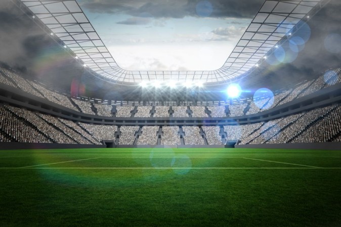 Large football stadium with lights photowallpaper Scandiwall