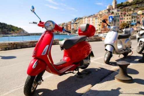 Picture of Red Vespa in the city