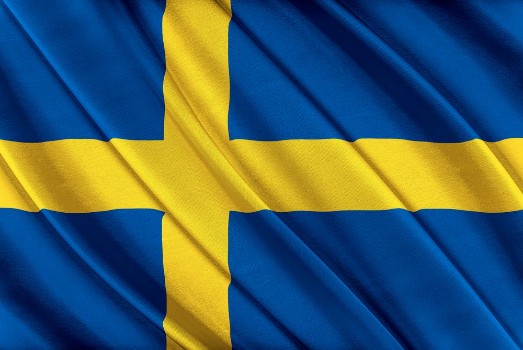 Bild på Colorful Swedish Flag Waving in The Wind
