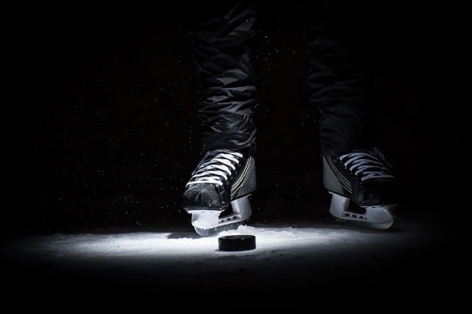 Afbeeldingen van Hockey player Legs only view