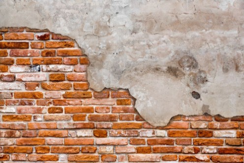 Afbeeldingen van Old brick wall torn