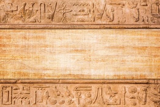 Picture of Old egypt hieroglyphs carved on the stone