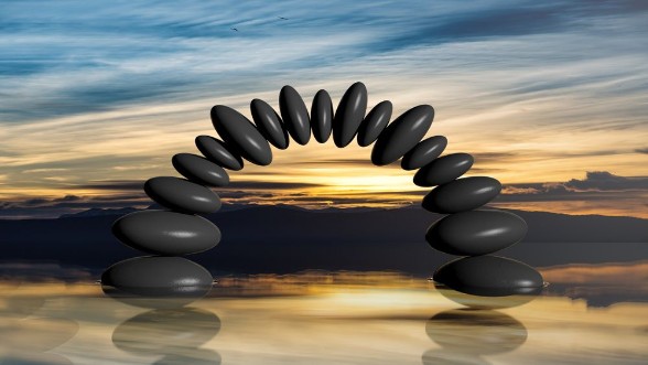 Afbeeldingen van 3D rendering of balancing stones forming an arch in water with sunset sky and peaceful landscape