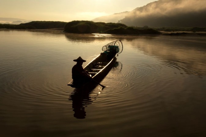 Afbeeldingen van Morning of fishermen in the Mekong River