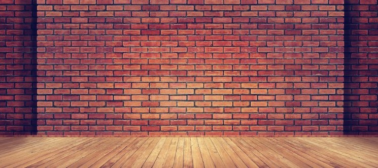 Bild på Red brick wall texture and wood floor background