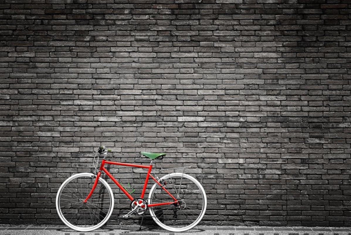 Afbeeldingen van Black and white photo of red bicycle - vintage film grain filter effect styles