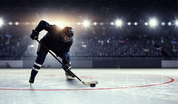 Hockey player on ice    Mixed media photowallpaper Scandiwall