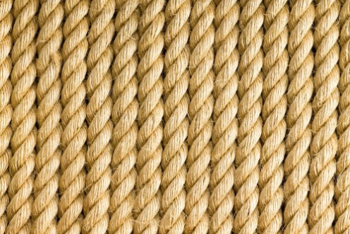 Bild på Vertical strands of rope as background