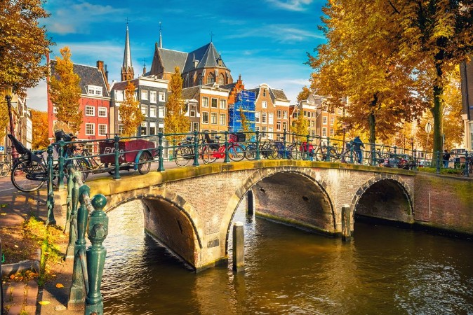 Bild på Bridges over canals in Amsterdam at autumn