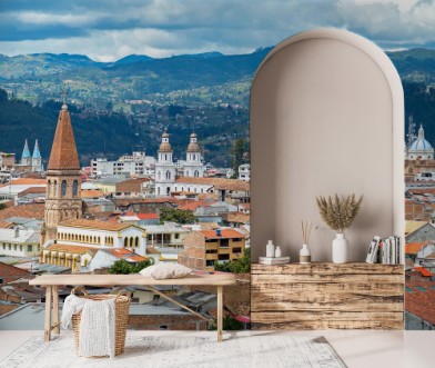 Bild på View of the city of Cuenca Ecuador with its many churches and rooftops on a cloudy day