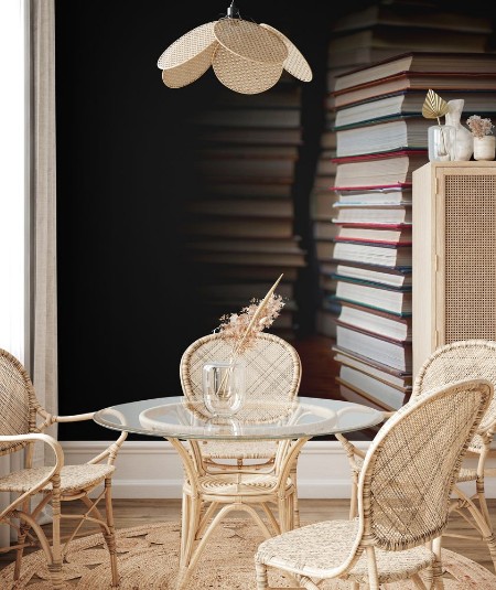 Picture of Stack of books against the background of a number of books a place for an inscription