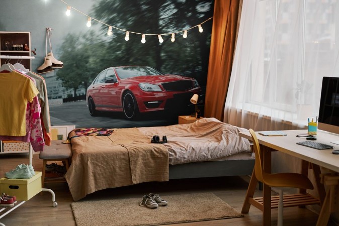 Picture of Red car drive on asphalt road in the city at daytime