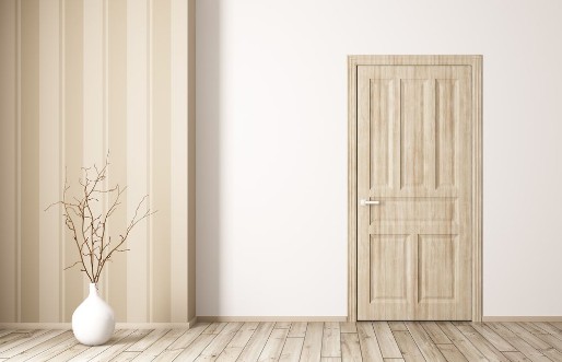 Bild på Interior of room with wooden door 3d rendering