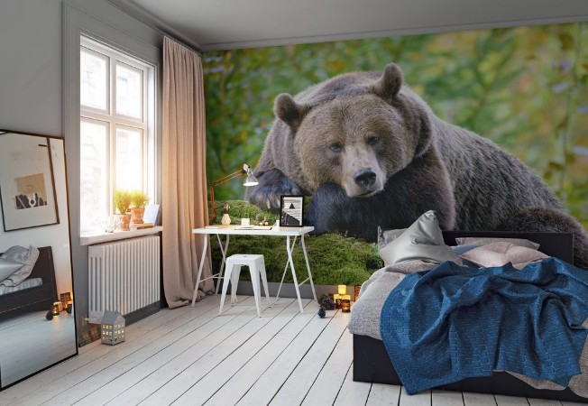 Bild på A brown bear in the forest Big Brown Bear Bear sits on a rock Ursus arctos