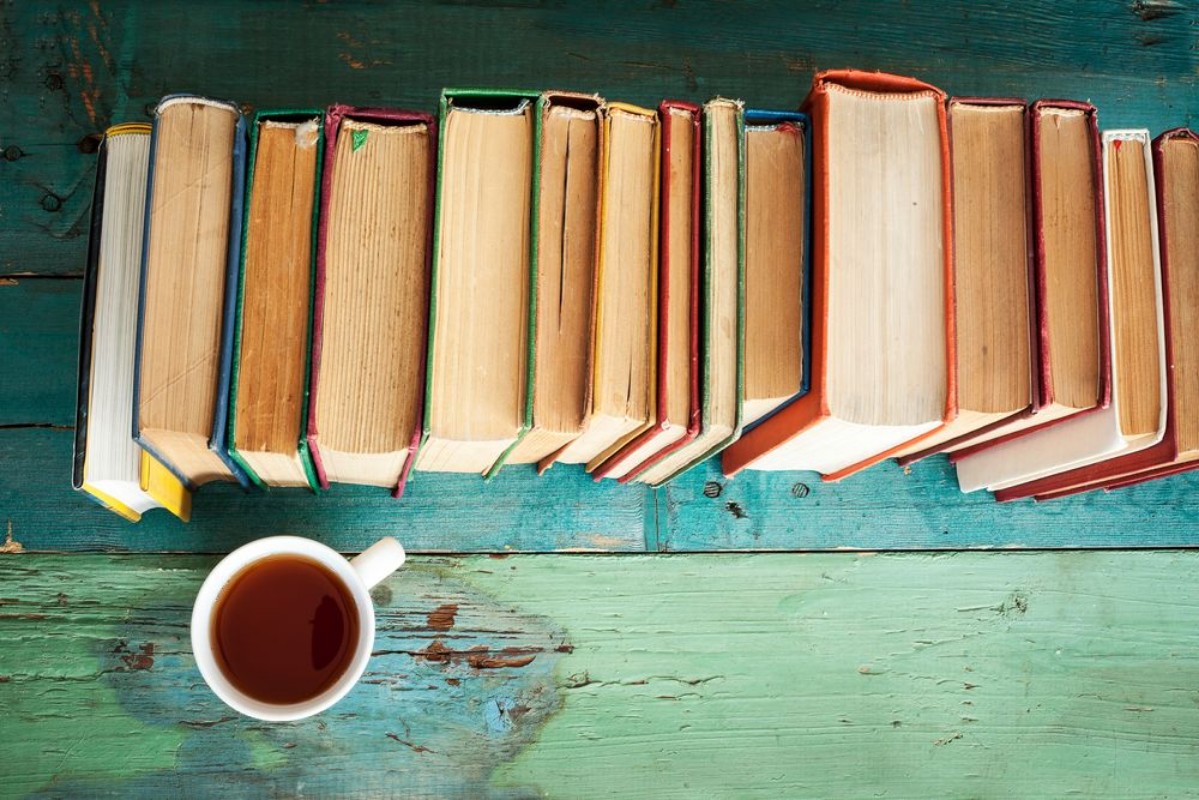 Image de Reading book with coffee on table