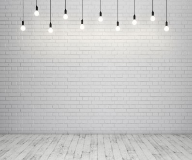 Afbeeldingen van Painted brick wall and wooden floor with glowing light bulbs 3D rendering