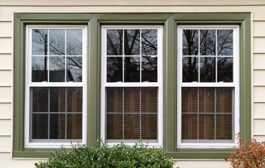 Afbeeldingen van New white with green trim vinyl replacement windows Horizontal