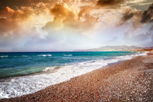 Bild på Beautiful colorful sunset on the sea shore