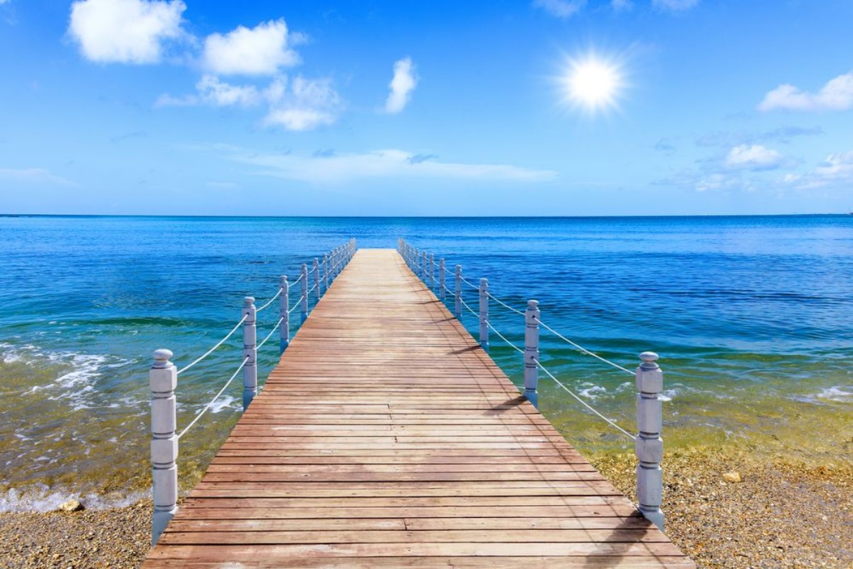 Picture of Wooden bridge juts out into  of the sea