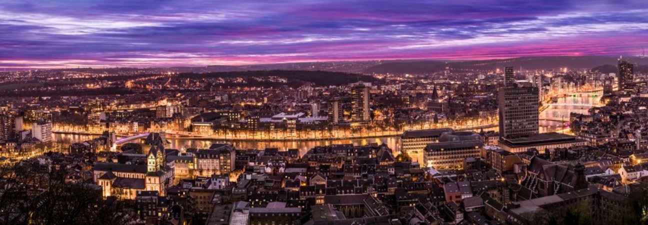 Picture of Cityscape from Mountain de Bueren in Liege Belgium at dusk The river Maas leads through the scenery