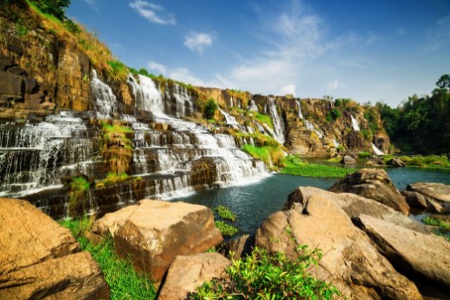 Afbeeldingen van Amazing view of natural cascading waterfall with crystal water