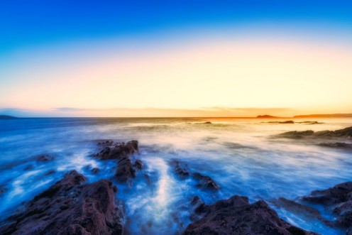 Afbeeldingen van Sunrise on the coast of Ireland Portmarnock Toned image