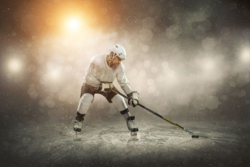 Afbeeldingen van Ice hockey player on the ice outdoors