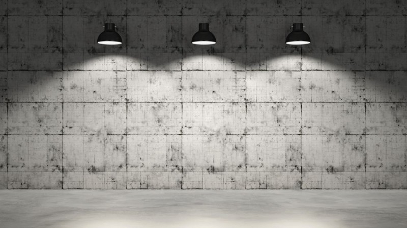 Picture of Concrete wall with three lamps hanging
