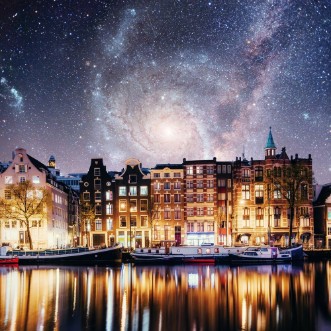 Afbeeldingen van Beautiful night in Amsterdam  illumination of buildings an