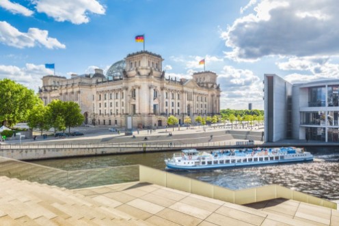 Berlin government district with Reichstag and ship on Spree river in summer Berlin Mitte Germany photowallpaper Scandiwall