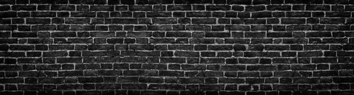 Afbeeldingen van Black brick wall wide panorama as a backdrop