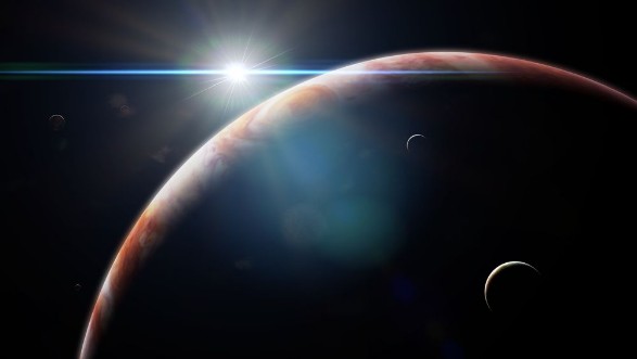 Afbeeldingen van Planet Jupiter with moons in front of the Sun