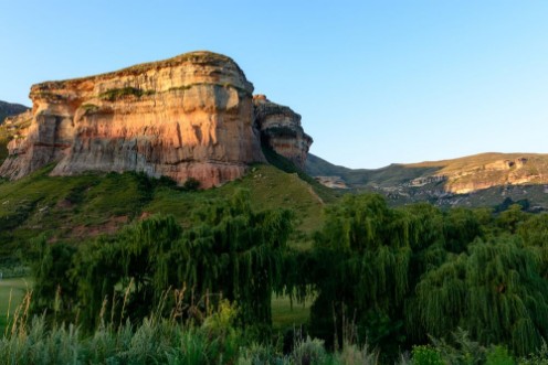 Picture of South Africa Drakensberge Golden Gate national park landscape  scenic panoramic color landscape picture taken on a sunny day - impressive nature with rock landmark blue skytress 
