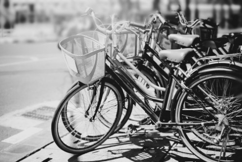 Image de Black and white travel bicycle for rent in urban vintage color effect