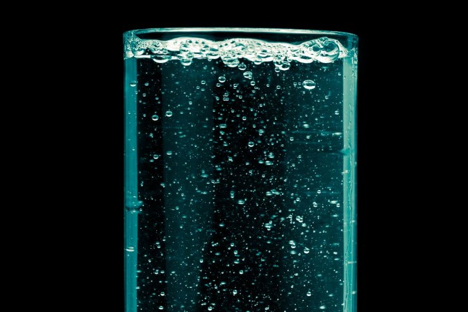 Picture of Aqua fresh drink water with bubble liquid drinking in art color tone