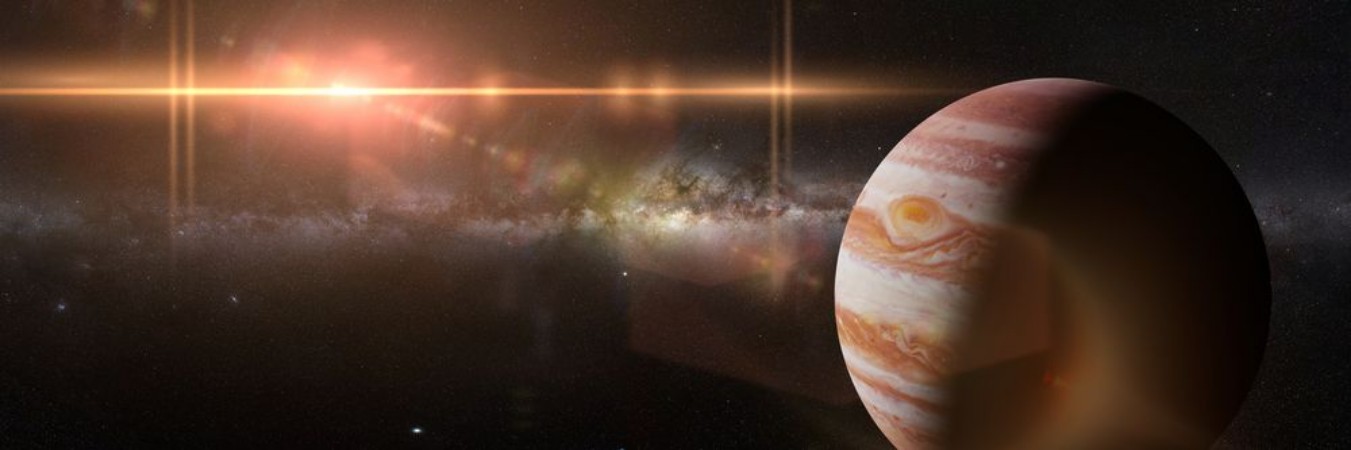 Picture of Planet Jupiter in front of the Milky Way galaxy and the Sun