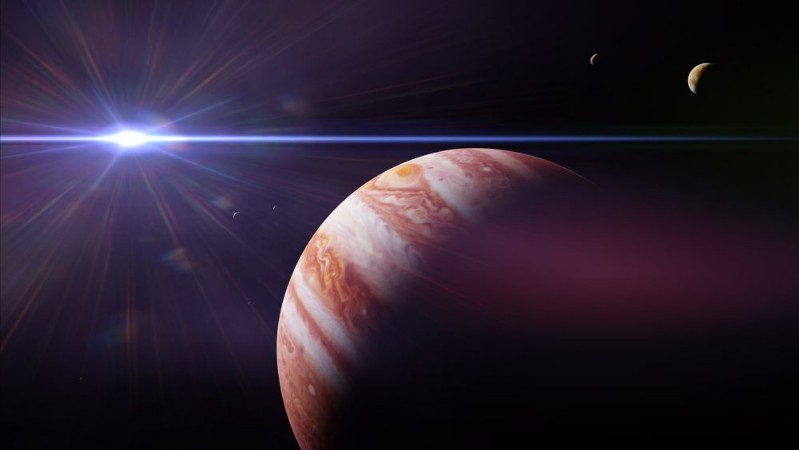 Afbeeldingen van Planet Jupiter with moons in front of the Sun