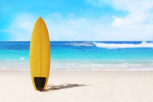 Afbeeldingen van Surfer board on the beach