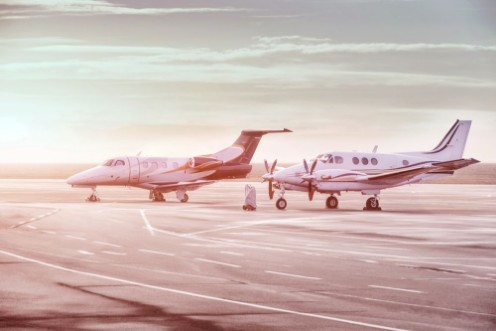 Picture of Private jet planes parking at the airport Private airplanes at sunset