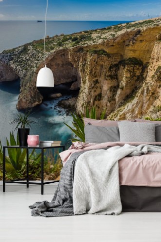 Afbeeldingen van Malta - The beautiful cliff of the Blue Grotto with plants in front