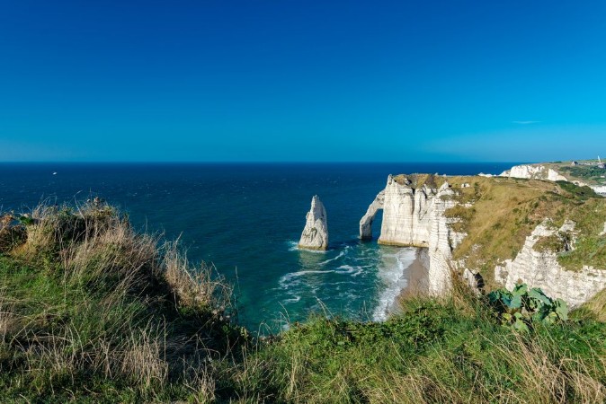 Bild på The cliffs named the needle and the aval in Etretat