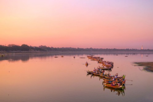 Picture of Traditional burmese boats on Taungthaman Lake at sunset in Amarapura Mandalay Myanmar
