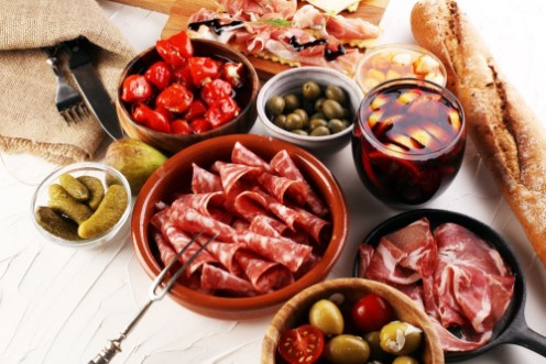 Picture of Spanish tapas and sangria on wooden table - mediterran antipasti set