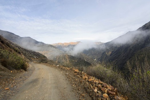 Bild på Road going up in the mountains Peruvian Andes South America