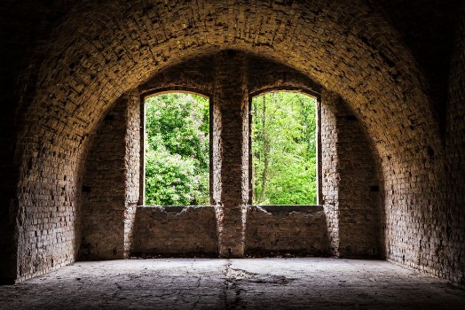 Bild på Brick vault old ancient castle room with windows grunge
