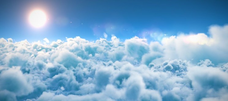 Bild på Scenic view of bright sun over white cloudscape